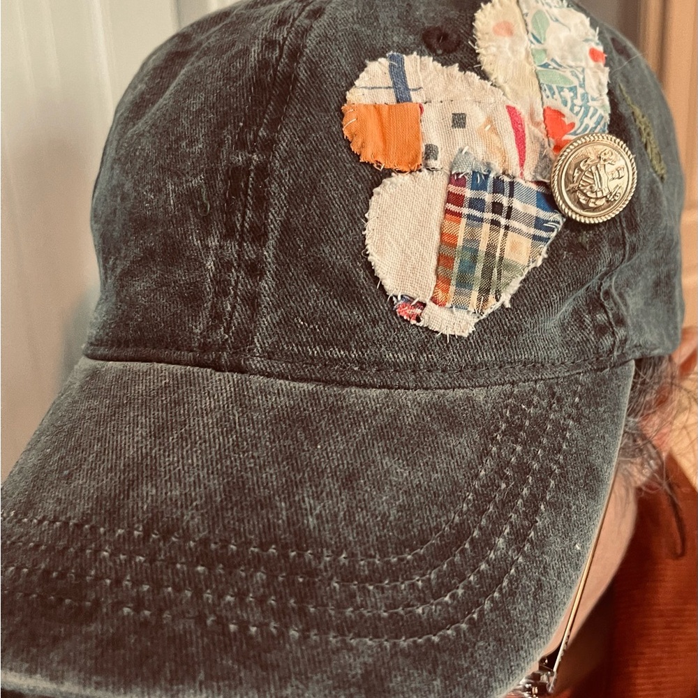 Black ponytail trucker ball cap